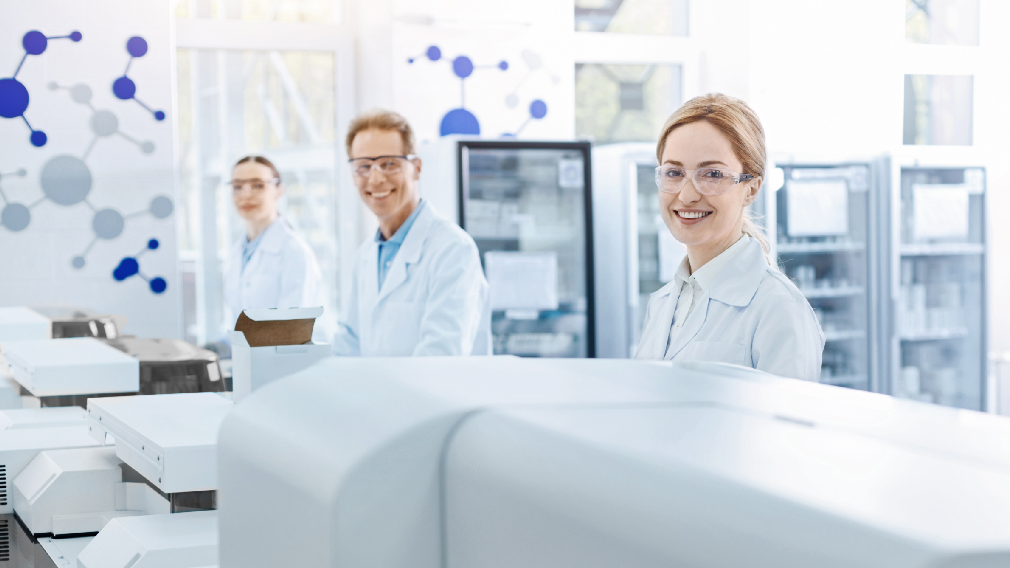 people in lab smiling